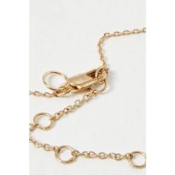 Oliver Bonas Gold Nerida Flower And Blue Stone Pendant Necklace -Oliver Bonas Shop unnamed file 1012