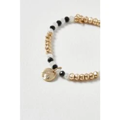 Oliver Bonas Natural Luella Monochrome Beads With Textured Disc Charm Bracelet -Oliver Bonas Shop unnamed file 2257