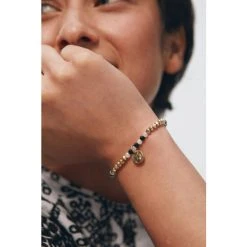 Oliver Bonas Natural Luella Monochrome Beads With Textured Disc Charm Bracelet -Oliver Bonas Shop unnamed file 2259